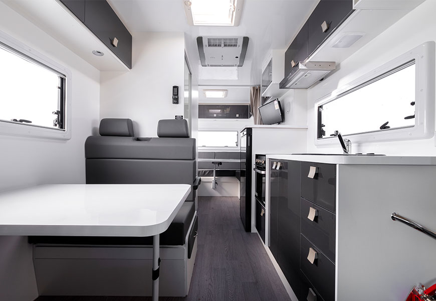 Interior of a Winnebago Motorhome showcasing comfort, craftsmanship giving confidence in our 3-year body and interior guarantee.